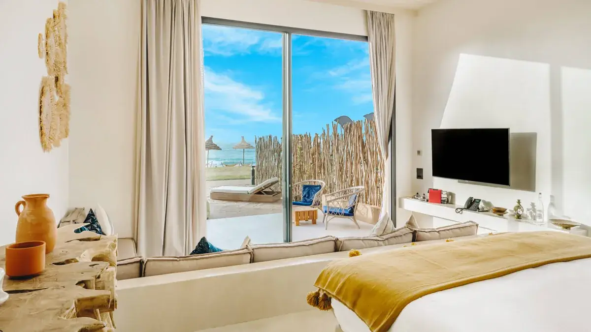 Suite lumineuse de Tulum Beach Resort avec vue sur la mer